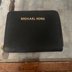 Black with gold hardware Michael Kors wallet